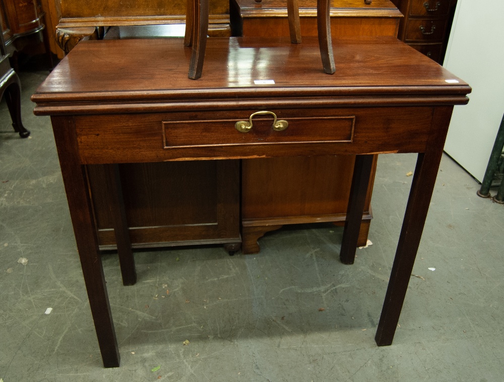 GEORGE III MAHOGANY FOLD OVER TEA TABLE WITH FRIEZE DRAWER, ON SQUARE SUPPORTS WITH CHAMFERRED INNER