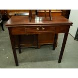 GEORGE III MAHOGANY FOLD OVER TEA TABLE WITH FRIEZE DRAWER, ON SQUARE SUPPORTS WITH CHAMFERRED INNER