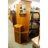 MID TWENTIETH CENTURY OAK HALL STAND AND A REPRODUCTION DRUM TABLE (2)