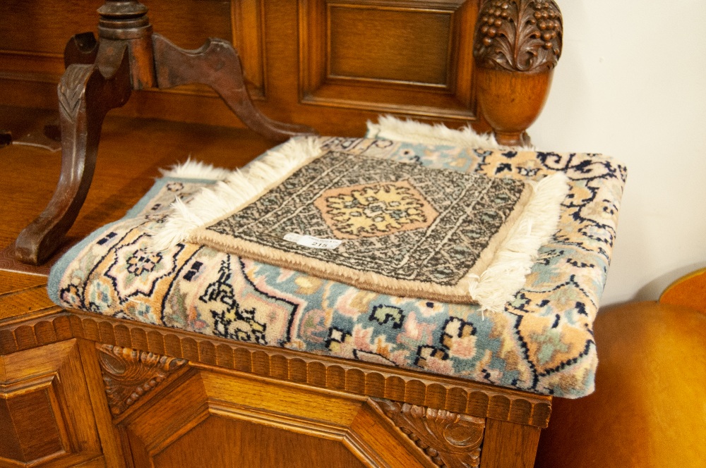 A PERSIAN RUG, WITH MEDALLION CENTRE, PINK AND PALE BLUE 5' X 3' AND A TINY PERSIAN MAT (2)