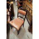 A SET OF FOUR MAHOGANY DINING CHAIRS, WITH OVERSTUFFED SEATS, RAIL AND CUSHION BACK SUPPORTS