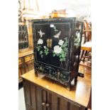A MODERN BLACK LACQUER CHINESE PETIT CABINET, TWO DOORS OVER TWO SHORT DRAWERS, DECORATED WITH LOW