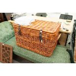 LARGE WICKER TRUNK, WICKER BASKET AND A WICKER CARPET BEATER