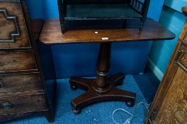 A VICTORIAN MAHOGANY SIDE TABLE WITH RECTANGULAR TOP, ON TURNED COLUMN, ON SHAPED QUARTETTE