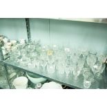 A QUANTITY OF CUT GLASS DRINKING GLASSES AND VARIOUS TUMBLERS ETC...