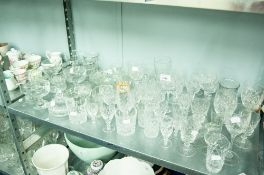 A QUANTITY OF CUT GLASS DRINKING GLASSES AND VARIOUS TUMBLERS ETC...