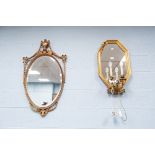 REGENCY STYLE OVAL WALL MIRROR WITH BEVEL EDGED PLATE, and ribbon tied bellflower pendant and