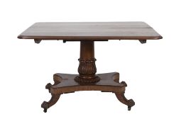 WILLIAM IV FIGURED MAHOGANY BREAKFAST TABLE, the rounded oblong tilt top above a heavy tapering