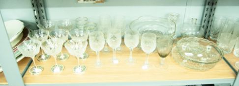 A QUALITY OF CUT GLASS DRINKING GLASSES, FRUIT BOWL AND MATCHING SMALLER SERVING BOWLS ETC......