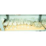 A QUALITY OF CUT GLASS DRINKING GLASSES, FRUIT BOWL AND MATCHING SMALLER SERVING BOWLS ETC......