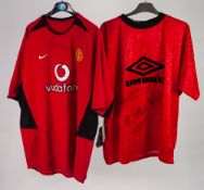 TWO SIGNED MANCHESTER UNITED FOOTBALL SHIRTS, one (Umbro) with five signatures, including: Lee