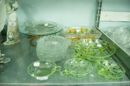 A QUANTITY OF MISC TABLE WARES TO INCLUDE; GLASS PLATES, A PUNCH BOWL AND CUPS, SERVING PLATTER