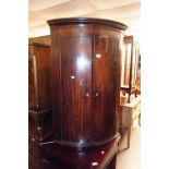 A VICTORIAN MAHOGANY CORNER CABINET, SOLID DOORS WITH IVORY ESCUTCHEONS