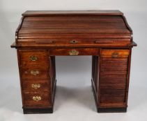 EARLY TWENTIETH CENTURY OAK ROLL-TOP DESK, of typical form, the interior fitted with short drawers