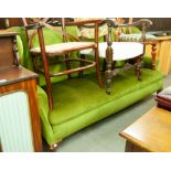 A LARGE GREEN VELOUR COVERED WINGED BACK SETTEE ON SHORT CABRIOLE FORELEGS