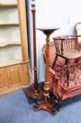 EARLY TWENTIETH CENTURY CARVED MAHOGANY TORCHERE, with part fluted column, the tripod support with