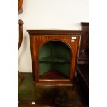 A SMALL MAHOGANY OPEN ARCHED NICHE CORNER CABINET