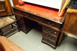 A REPRODUCTION MAHOGANY TWIN PEDESTAL DESK