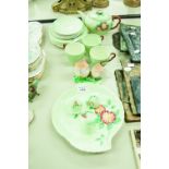 A SET OF CARLTON WARE GREEN LEAF PART TEA SERVICE WITH FLORAL DECORATION WITH DOUBLE EGG CUP