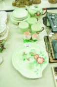 A SET OF CARLTON WARE GREEN LEAF PART TEA SERVICE WITH FLORAL DECORATION WITH DOUBLE EGG CUP