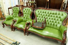 A REPRODUCTION LOUNGE SUITE COMPRISING; A PAIR OF SPOON BACK ARMCHAIRS WITH GREEN HIDE UPHOLSTERY,