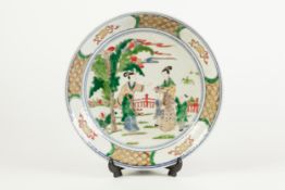 NINETEENTH CENTURY CHINESE FAMILLE VERTE PORCELAIN SAUCER DISH, decorated to the centre with figures