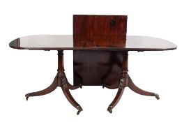 ANTIQUE MAHOGANY TWIN PILLAR DINING TABLE WITH SINGLE LEAF INSERT, having an ivorine trade label '