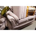 LOUNGE SUITE OF FOUR PIECES COVERED IN PINK FABRIC, VIZ A THREE SEATER SETTEE, A LOUNGE CHAIR AND