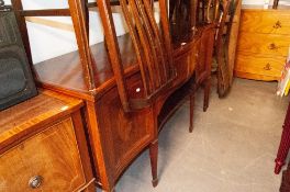 AN EDWARDIAN INLAID MAHOGANY SERPENTINE FRONT SIDEBOARD, TWO CUPBOARDS FLANKING ONE LARGE CENTRAL