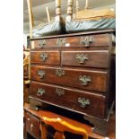 A SMALL GEORGIAN MAHOGANY CHEST OF OROLO MOULDED DRAWERS ON REPLACED BRACKET FEET