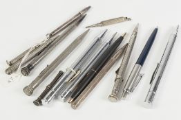 A COLLECTION OF SILVER, SILVER PLATE AND WHITE METAL PROPELLING PENS AND PENCILS to include silver