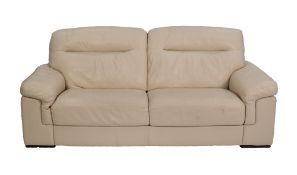 MODERN PARCHMENT COLOURED LEATHER THREE SEATER SETTEE, with two large, fixed back and seat