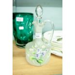 A VICTORIAN GLASS DECANTER AND STOPPER PAINTED WITH FLOWERS