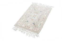 WASHED CHINESE EMBOSSED SELF COLOURED MUSHROOM RUG, 4'4" x 2 '3", A SMALL CHINESE RUG, of aubusson
