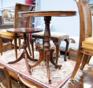 NINETEENTH CENTURY MAHOGANY TRIPOD OCCASIONAL TABLE, with oval top, and A SIMILAR REPRODUCTION