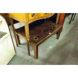 A MAHOGANY OBLONG COFFEE TABLE WITH DECORATIVE BLACK GLASS TOP DEPICTING TERRESTRIAL GLOBES, BRASS