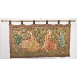 FABRIC WALL HANGING REPLICATING A MEDIAEVAL TAPESTRY printed with courtiers and ladies in a garden