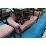 LATE NINETEENTH CENTURY CONTINENTAL CARVED MAHOGANY THREE SEATER SETTEE, the moulded and carved