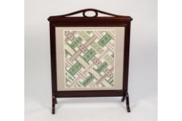 AN OAK FRAMED FIRESCREEN WITH INSET TAPESTRY PANEL