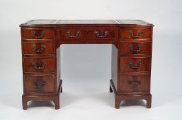 MODERN REPRODUCTION GEORGIAN STYLE FIGURED MAHOGANY TWIN PEDESTAL LADIES DESK, The moulded top inset