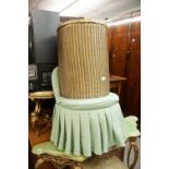 A LOOM SEMI-CIRCULAR LINEN RECEIVER AND A LADY'S BOUDOIR ARMLESS EASY CHAIR, IN BROWN FABRIC (2)