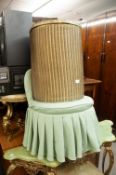 A LOOM SEMI-CIRCULAR LINEN RECEIVER AND A LADY'S BOUDOIR ARMLESS EASY CHAIR, IN BROWN FABRIC (2)