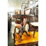 A VICTORIAN WALNUT AND INLAID CIRCUALR PEDESTAL TABLE, WITH SHAPED FRIEZE ON TURNED COLUMN AND