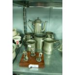 A LATE VICTORIAN BRITANNIA METAL COFFEE POT AND FIVE OTHER PIECES OF HAMMERED PEWTER VARIOUS