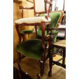 A VICTORIAN SPOON BACK ARMCHAIR, IN DARK GREEN VELVET