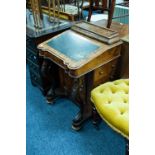 VICTORIAN CARVED WALNUT DAVENPORT DESK, of typical form with bombe shaped stationary compartment,