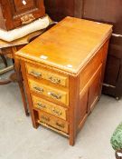 JACOBEAN STYLE OAK BUREAU, WITH TWO LONG DRAWERS, ON CUP AND COVER SUPPORTS