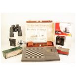 KASPAROV PRISMA CHESS COMPUTER, also a leather cased BACKGAMMON SET, and a pair of PRAKTICA SPORT 12