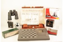 KASPAROV PRISMA CHESS COMPUTER, also a leather cased BACKGAMMON SET, and a pair of PRAKTICA SPORT 12