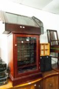 A REPRODUCTION MAHOGANY CORNER DISPLAY UNIT WITH ARCHED GLAZED DOOR AND MATCHING CABINET WITH SONY